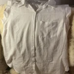 Thumbnail for A pretty, flowing sleeveless blouse.