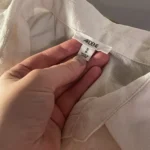 Thumbnail for A pretty, flowing sleeveless blouse.