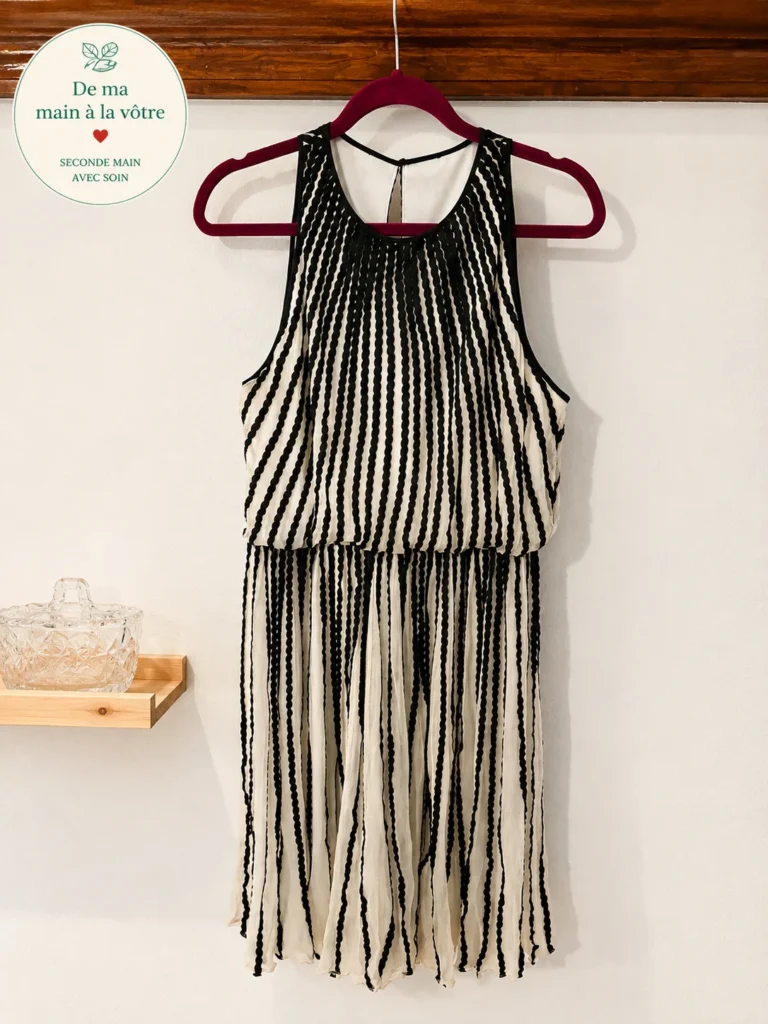 Featured image for Black and ivory pleated midi dress