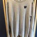 Featured thumbnail for Chandail Play Comme des garçons