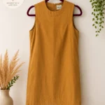 Featured thumbnail for Betina Lou dress in mustard-coloured linen and cotton