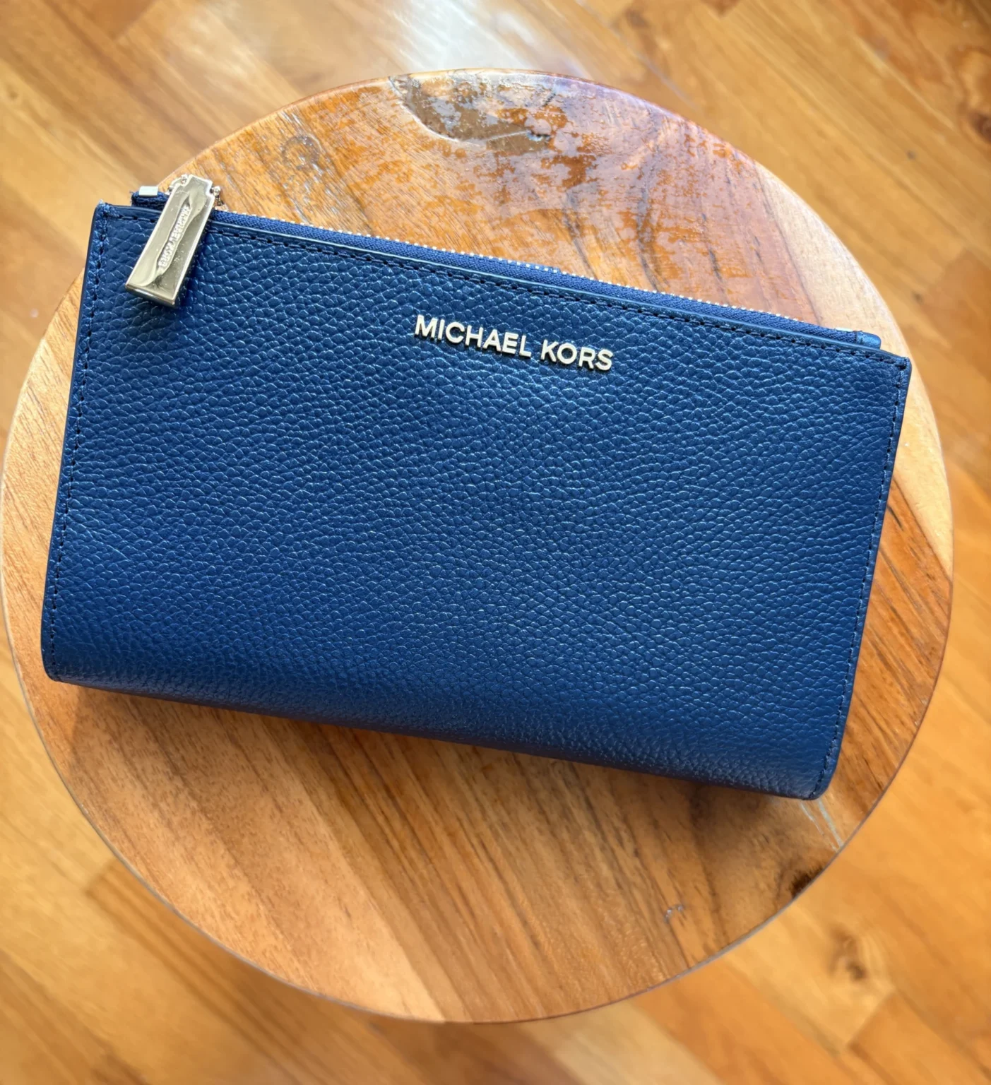 Featured image for Large, brand-new Michael Kors wallet in navy blue