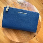 Featured thumbnail for Large, brand-new Michael Kors wallet in navy blue