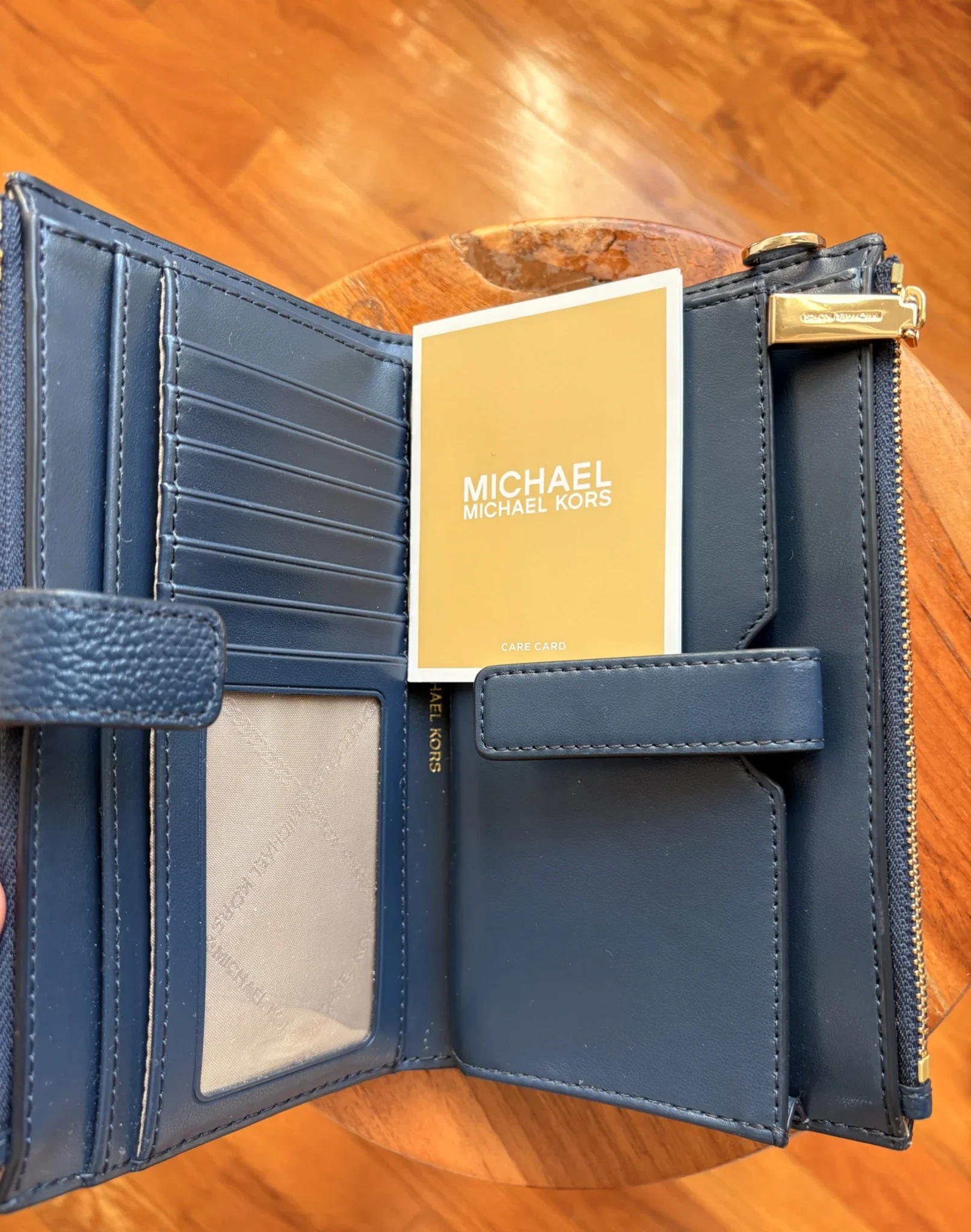 Image for Large, brand-new Michael Kors wallet in navy blue