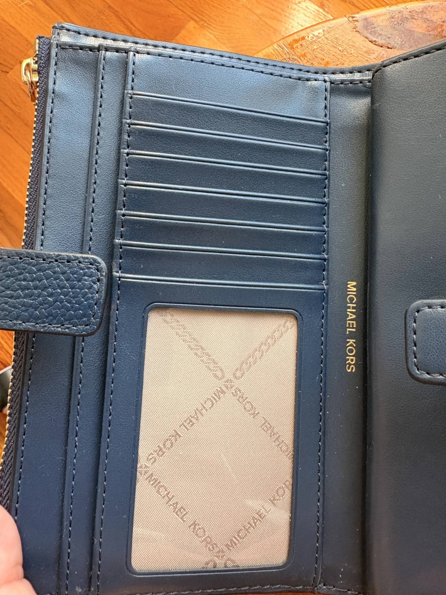 Image for Large, brand-new Michael Kors wallet in navy blue