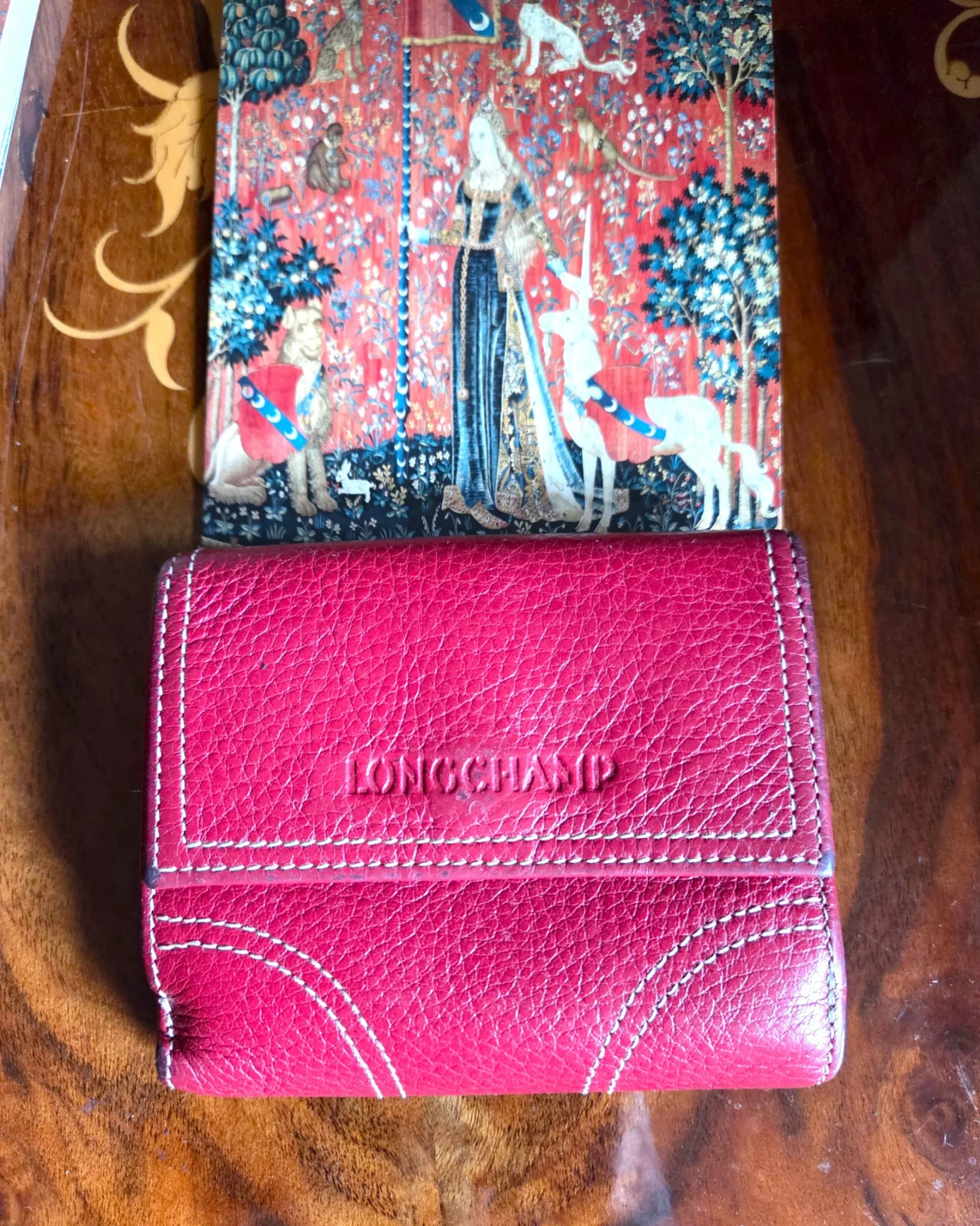 Featured image for Longchamp Le Foulonné red wallet
