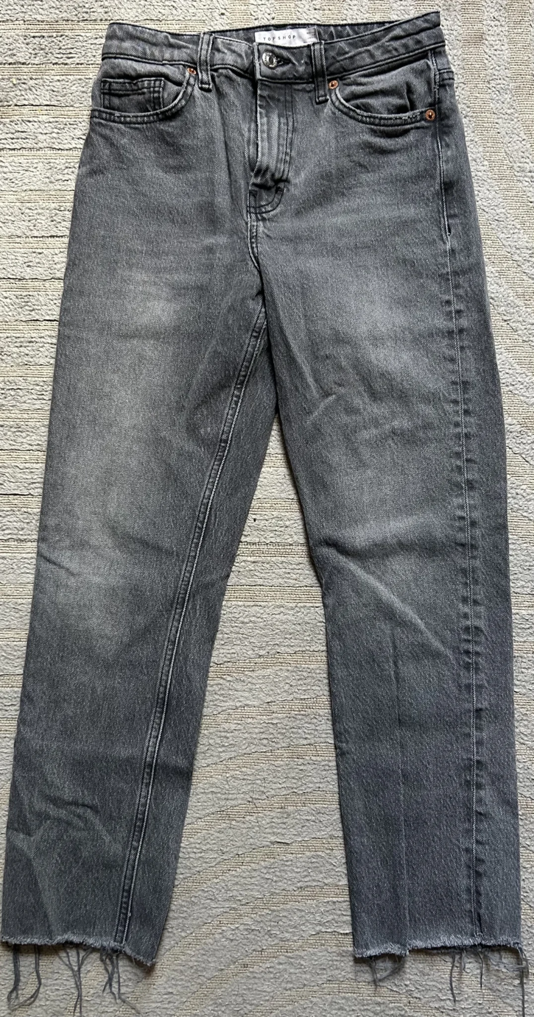 Featured image for Faded grey denim trousers, straight-leg fit to the ankle