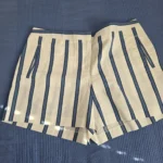 Featured thumbnail for Lacoste shorts with blue stripes