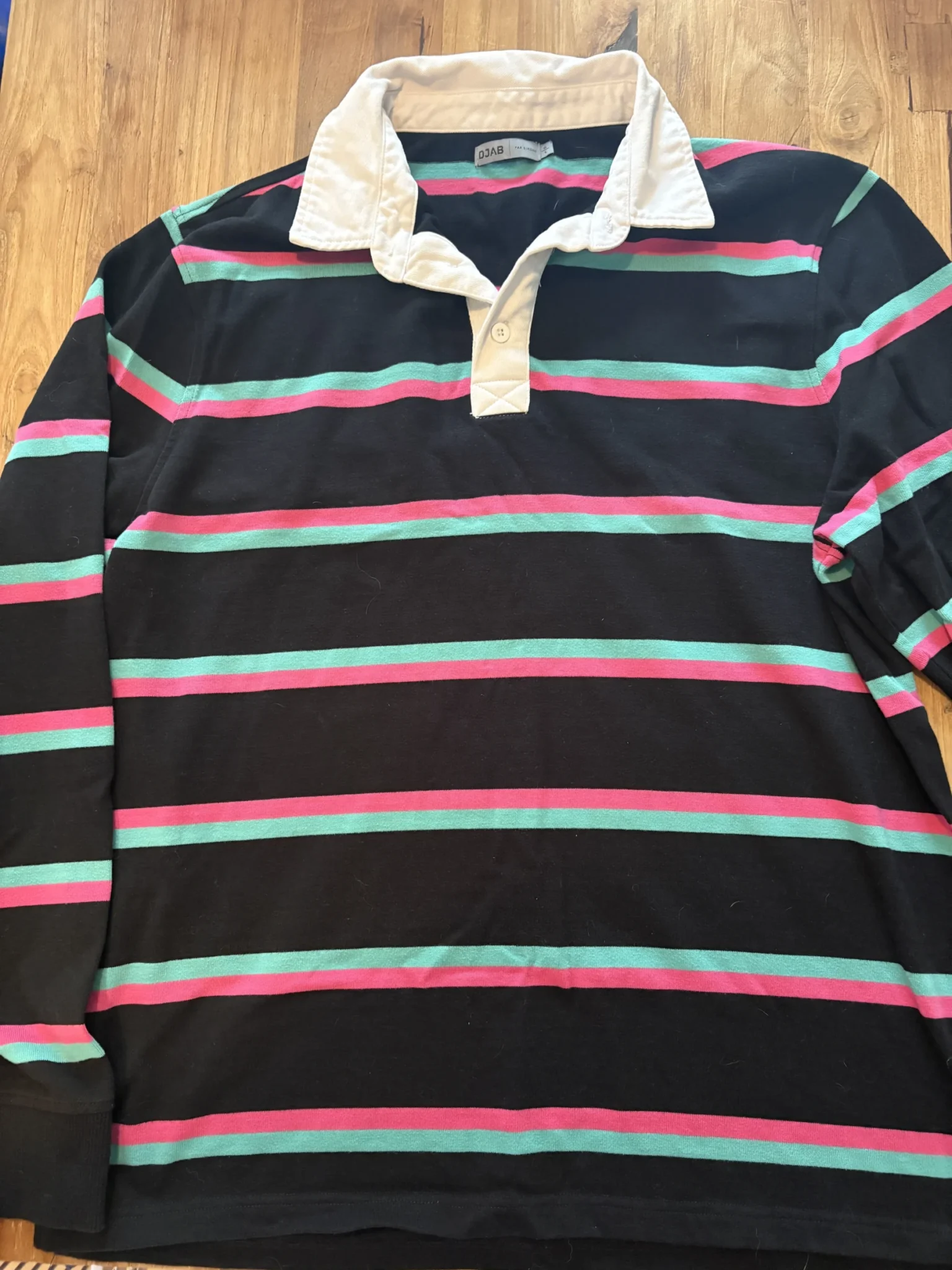Featured image for DJAB long-sleeved rugby polo shirt by Simons – black, pink and turquoise – Size L