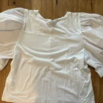 Featured thumbnail for White DKNY jumper with puff sleeves – Size XL