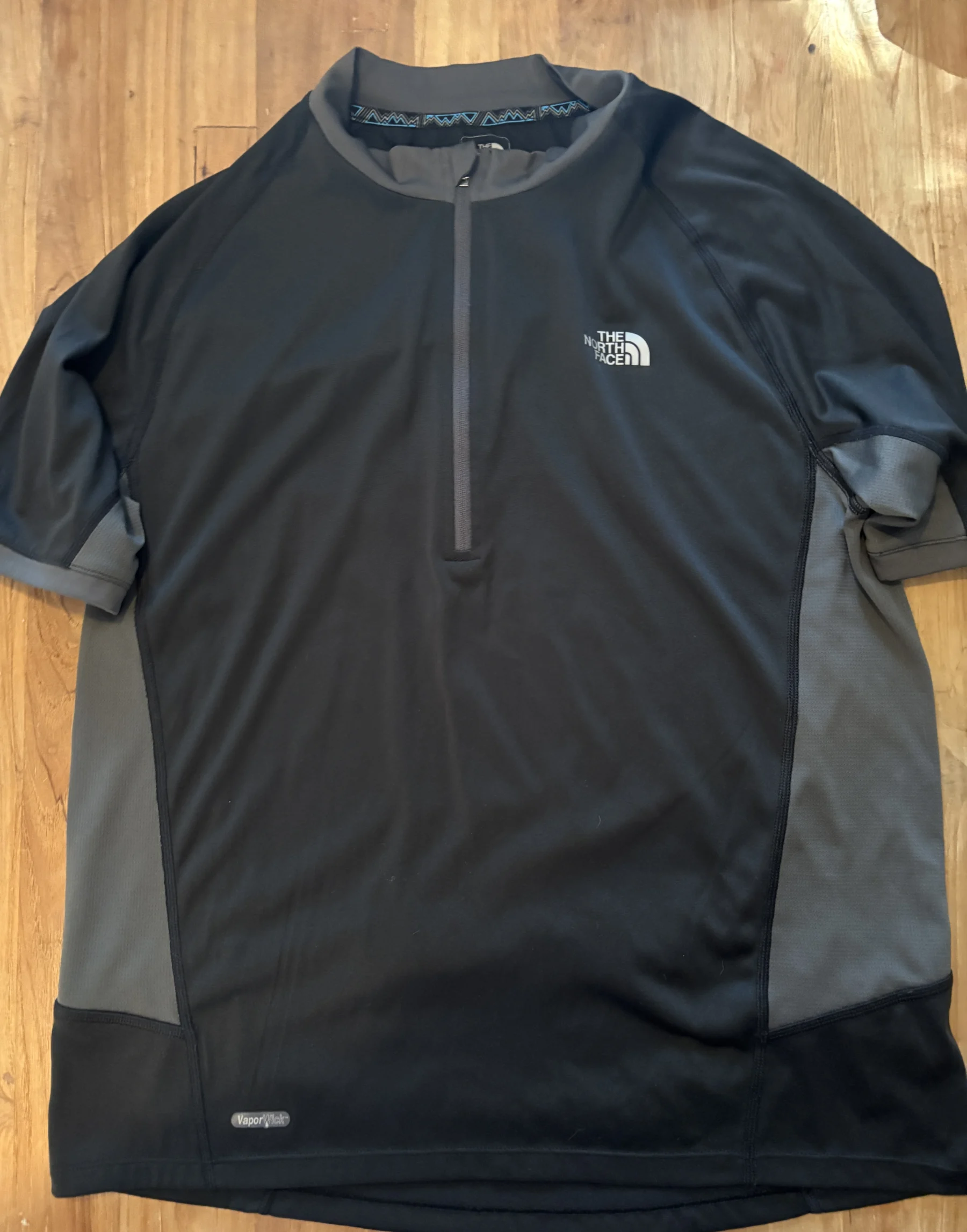 The North Face – Haut technique VaporWick homme – Taille M The North Face seconde main