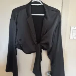 Featured thumbnail for A lovely cropped blouse with a front fastening