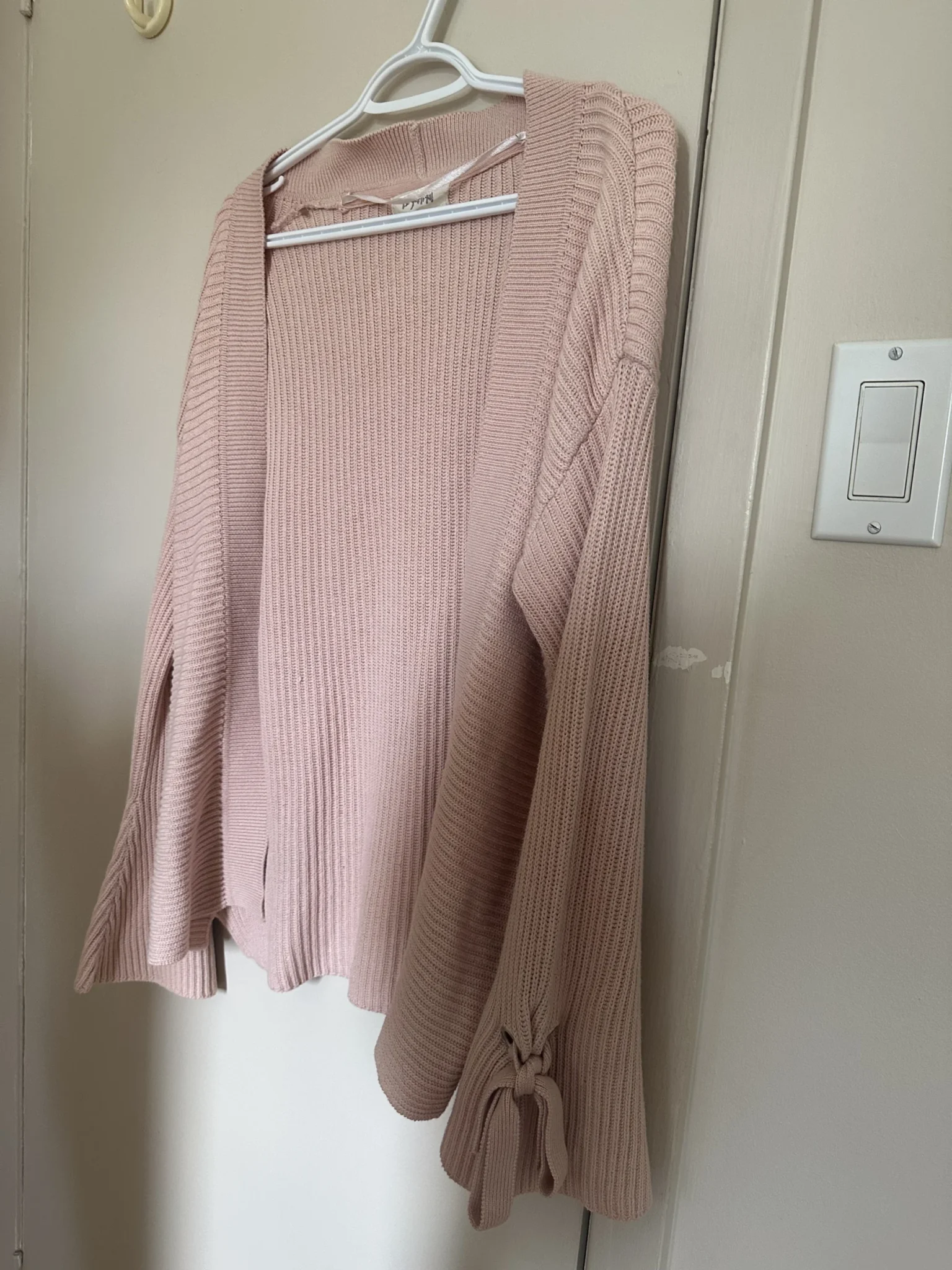 Image for Wide-sleeved cardigan with a bow