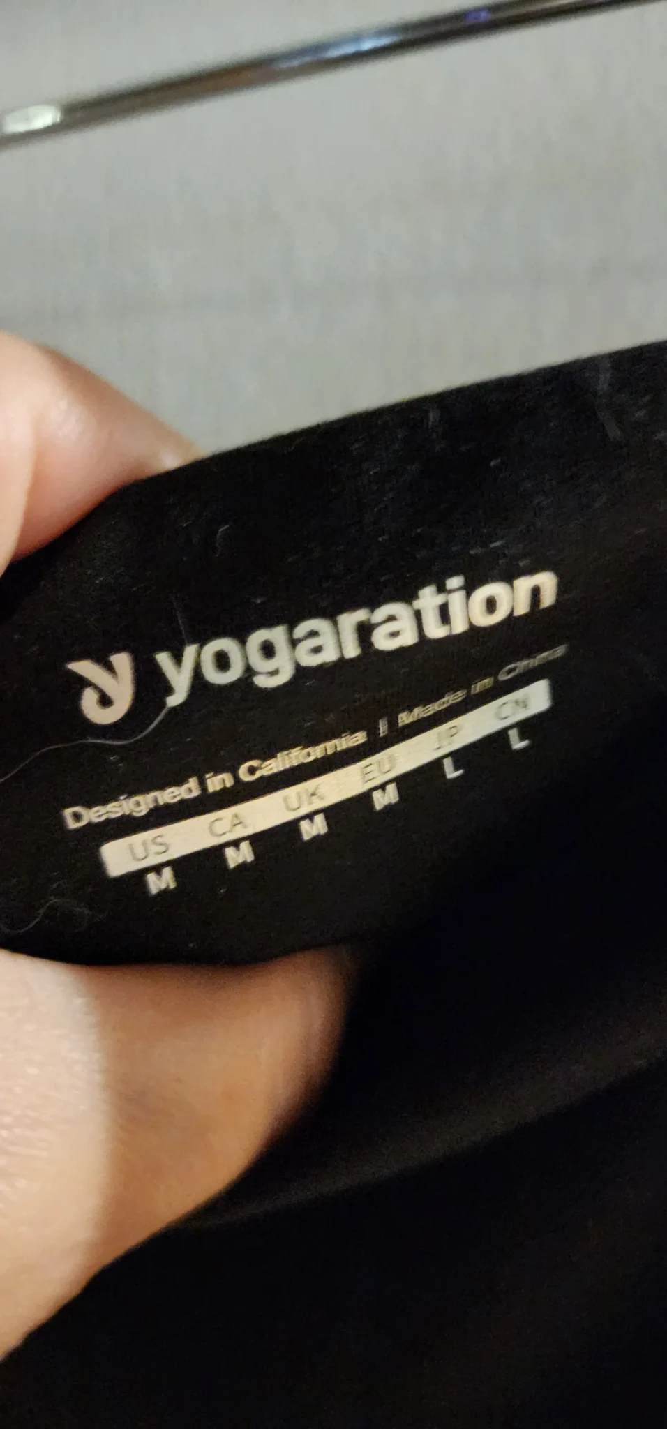 Image for Leggings noire avec poches sur le côté.