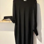 Featured thumbnail for Black Calvin Klein dress with sheer sleeves – size L
