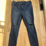 Featured thumbnail for Skinny jeans with a hole in the knee