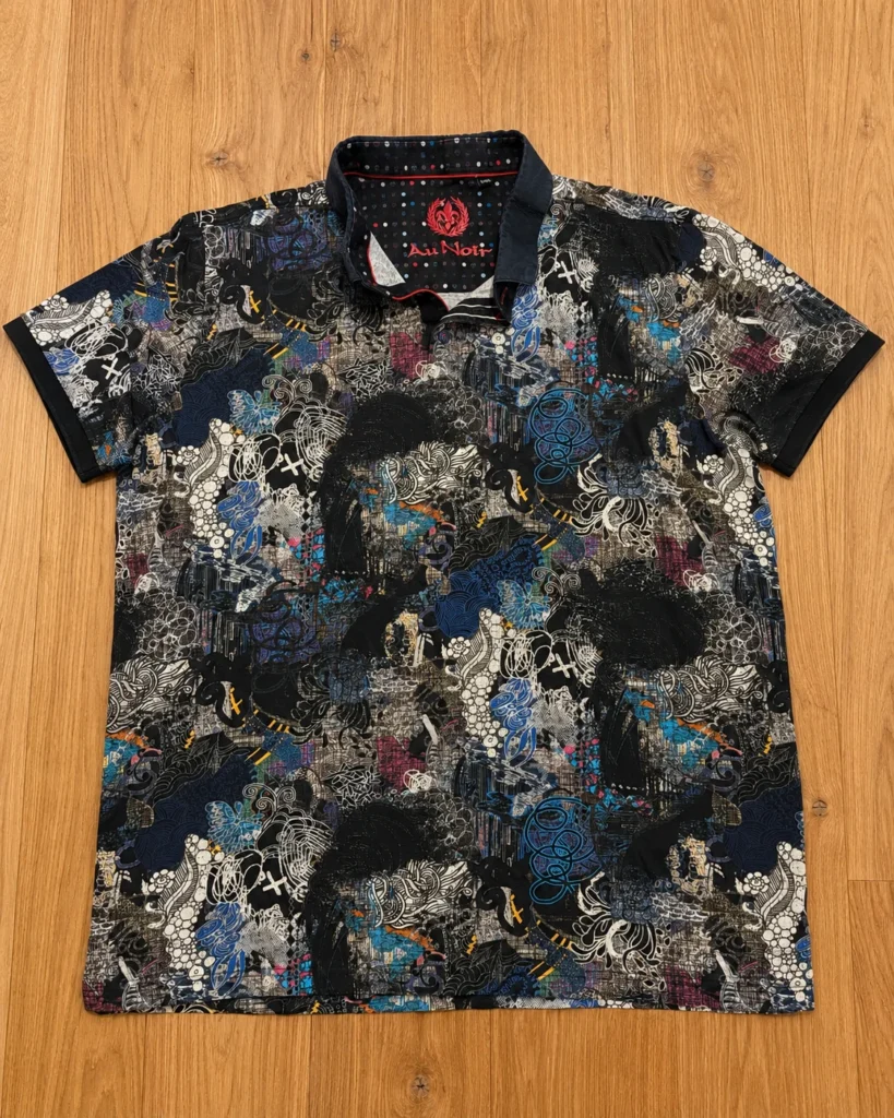 Featured image for Black polo shirt with abstract graphic patterns – size L