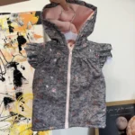Featured thumbnail for Manteau Mi-Saison sans manches 24M