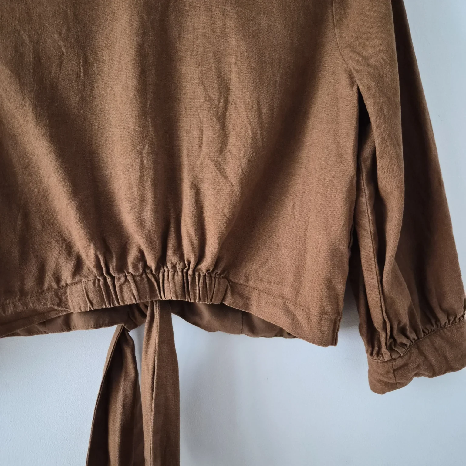 Image for Short blouse with a bow at the front