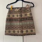Featured thumbnail for Geometric Jacquard Snap Front Mini Skirt