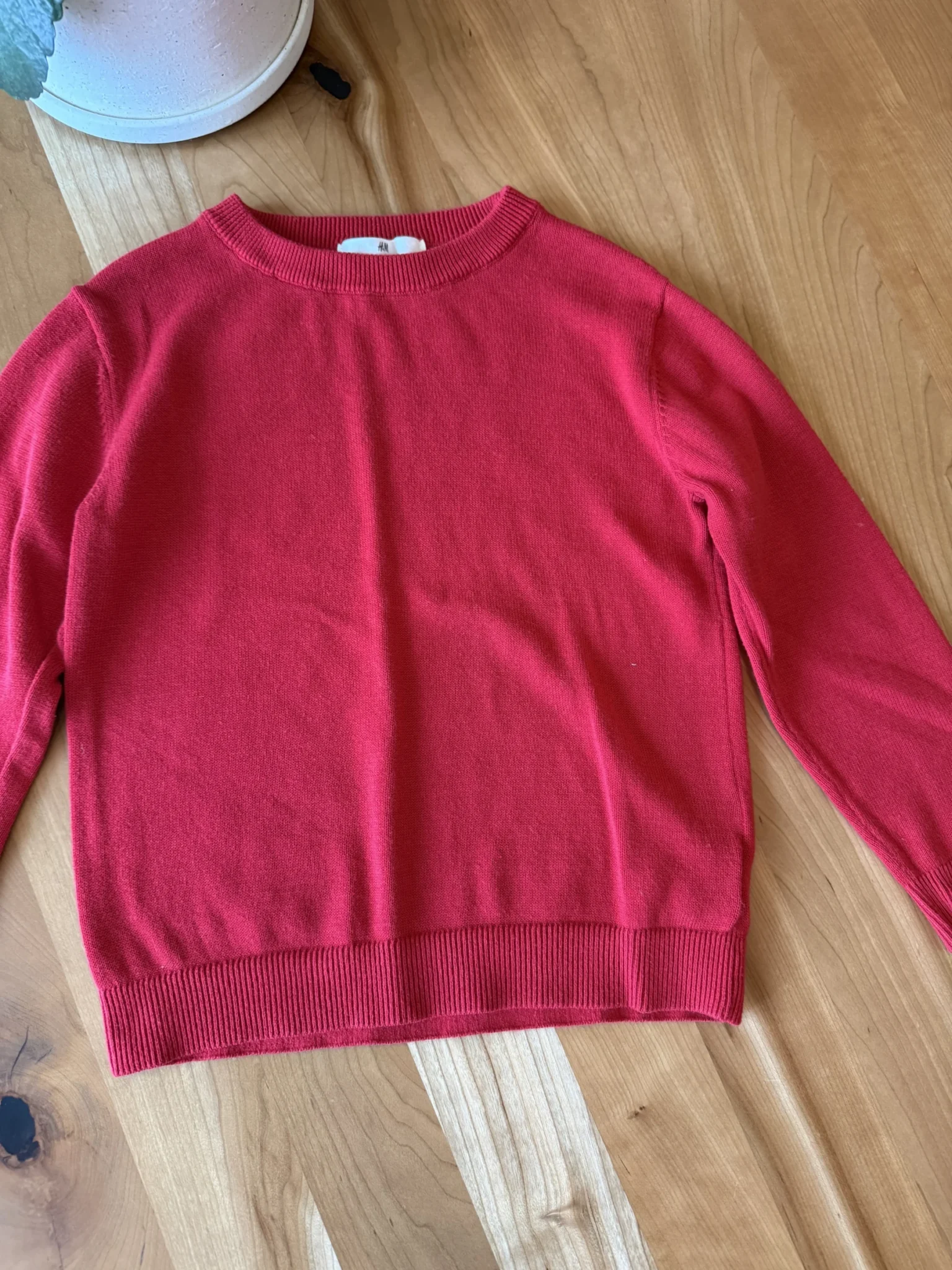 Image for red long-sleeved jumper