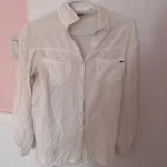 Featured thumbnail for White long-sleeved shirt