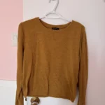 Featured thumbnail for Jumper with buttons on the sleeves
