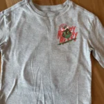 Thumbnail for Long-sleeved grey Grinch top