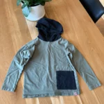Featured thumbnail for Green long-sleeved hooded top