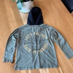Thumbnail for Green long-sleeved hooded top