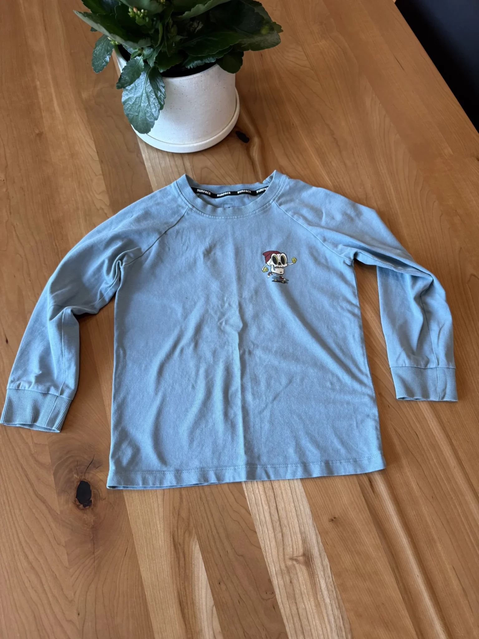 Featured image for Skeleton blue long-sleeved top