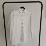 Featured thumbnail for White long-sleeved shirt