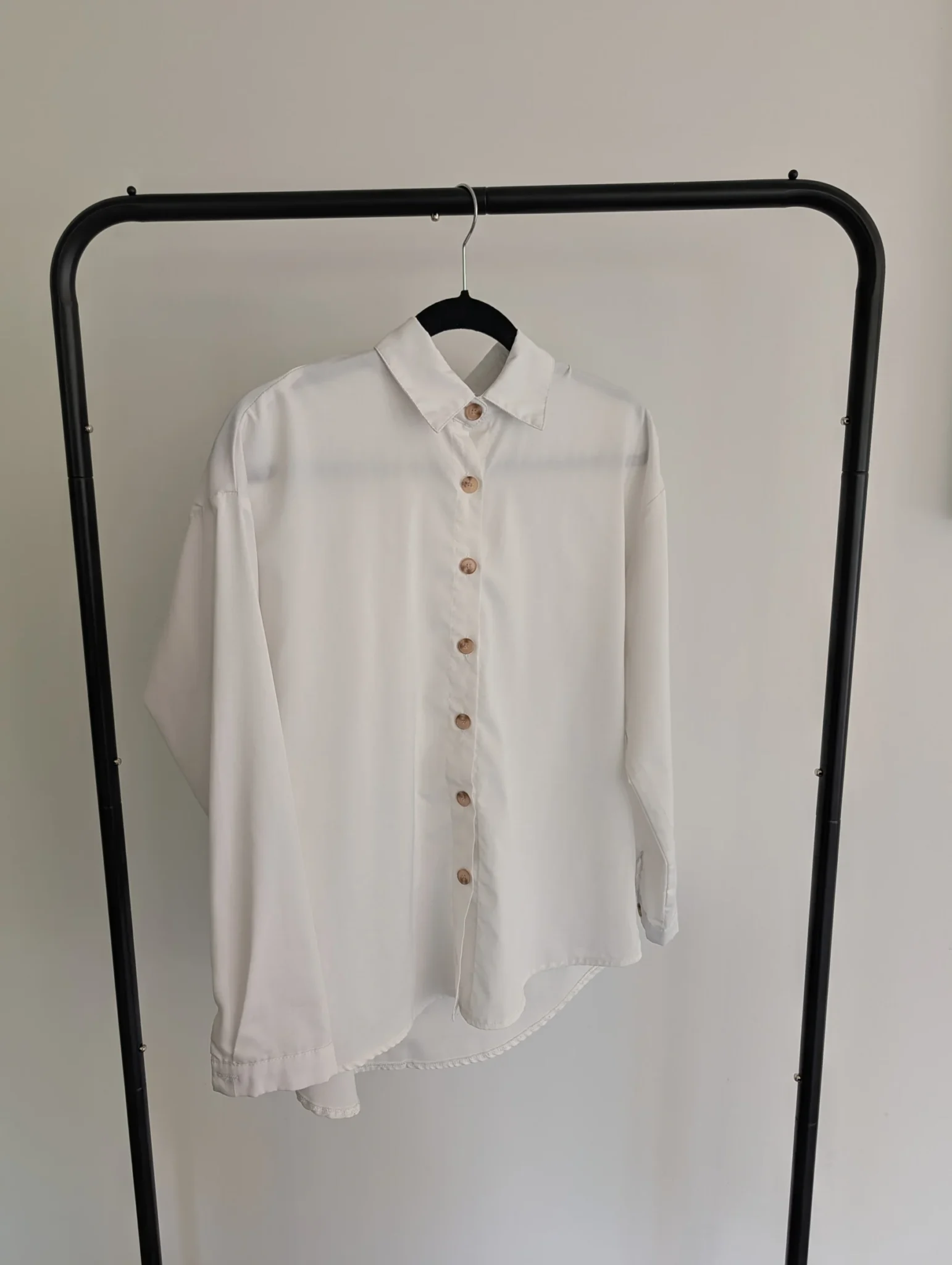 Featured image for White long-sleeved shirt