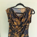 Featured thumbnail for Sleeveless jumper with a draped front