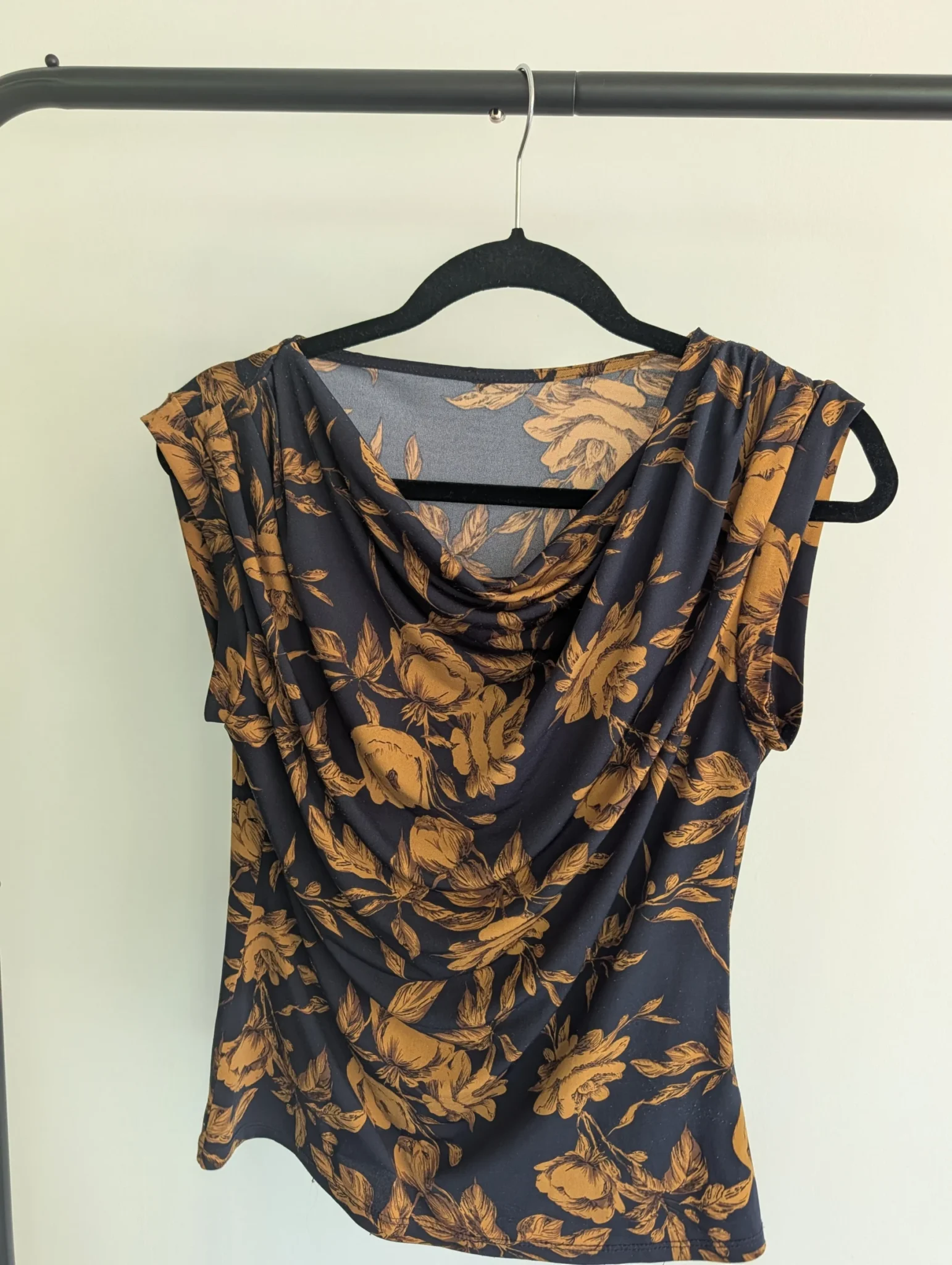 Featured image for Sleeveless jumper with a draped front