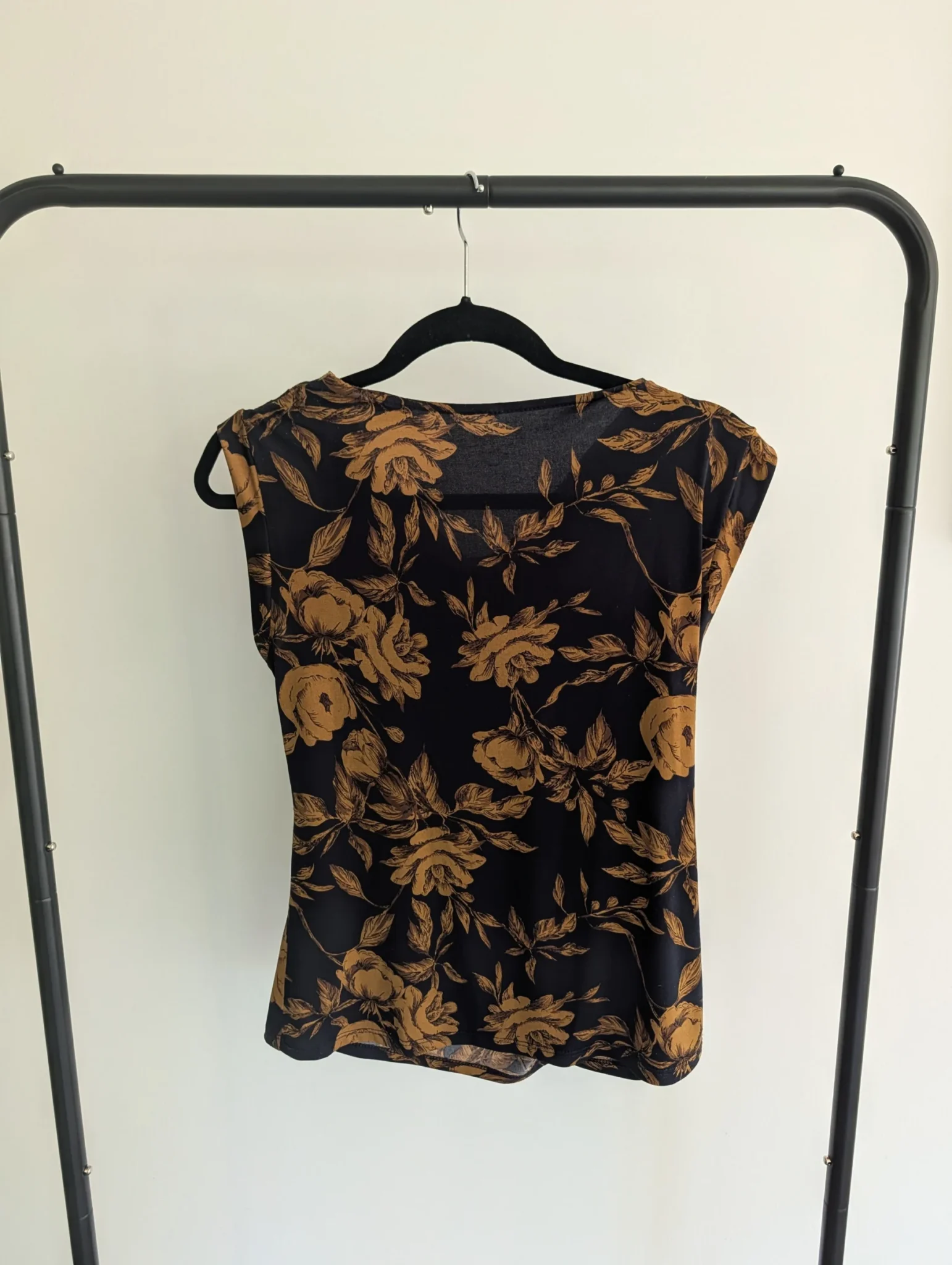 Image for Sleeveless jumper with a draped front