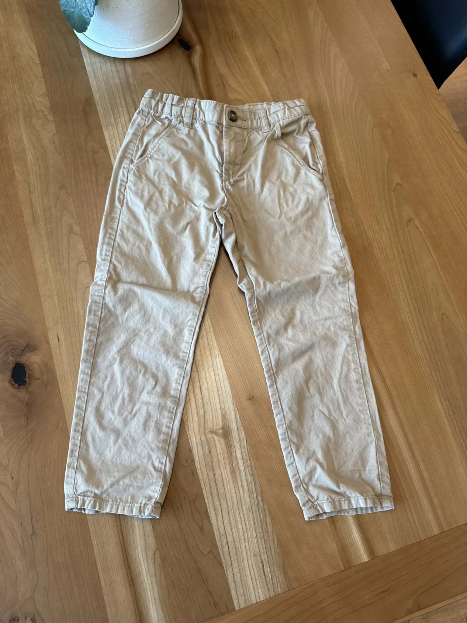 Featured image for Beige trousers