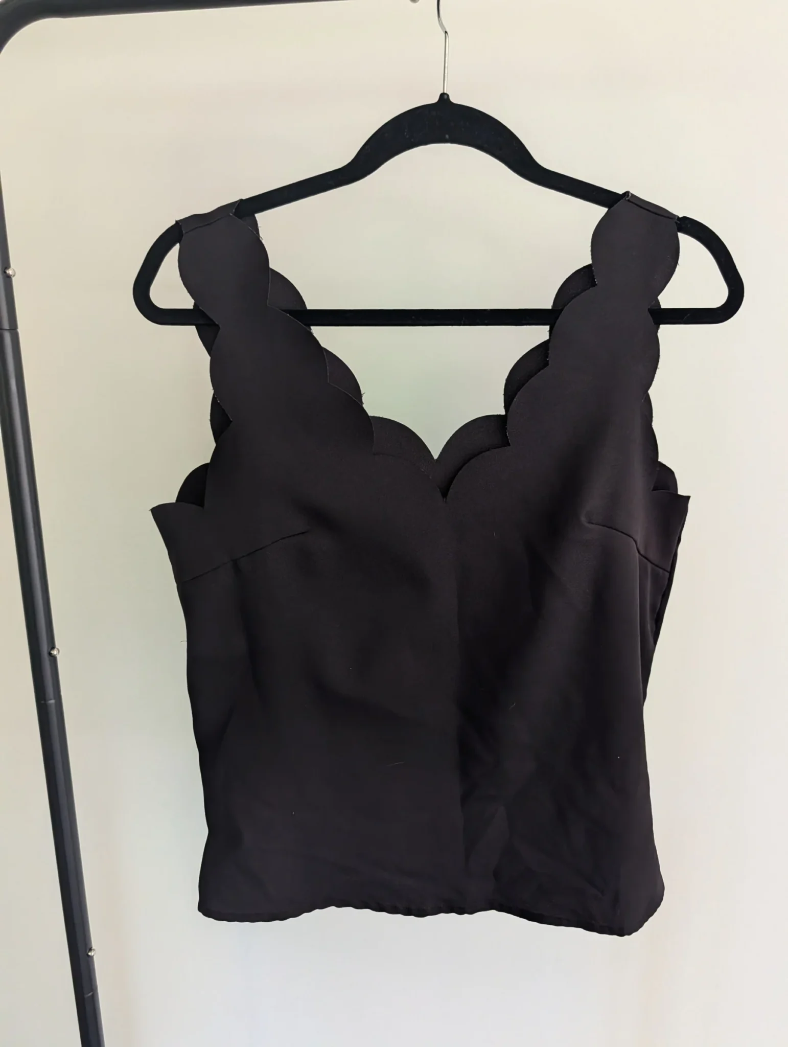 Featured image for Black camisole with textured straps
