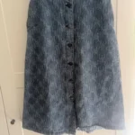 Featured thumbnail for Jupe denim texturé mi-longue
