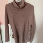 Featured thumbnail for Dynamite roll-neck jumper