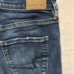 Thumbnail for Jeans American Eagle avec trou au genou