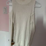 Featured thumbnail for Turtleneck jumper with cut-outs at the shoulders