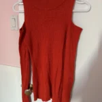 Featured thumbnail for Turtleneck jumper with cut-outs at the shoulders