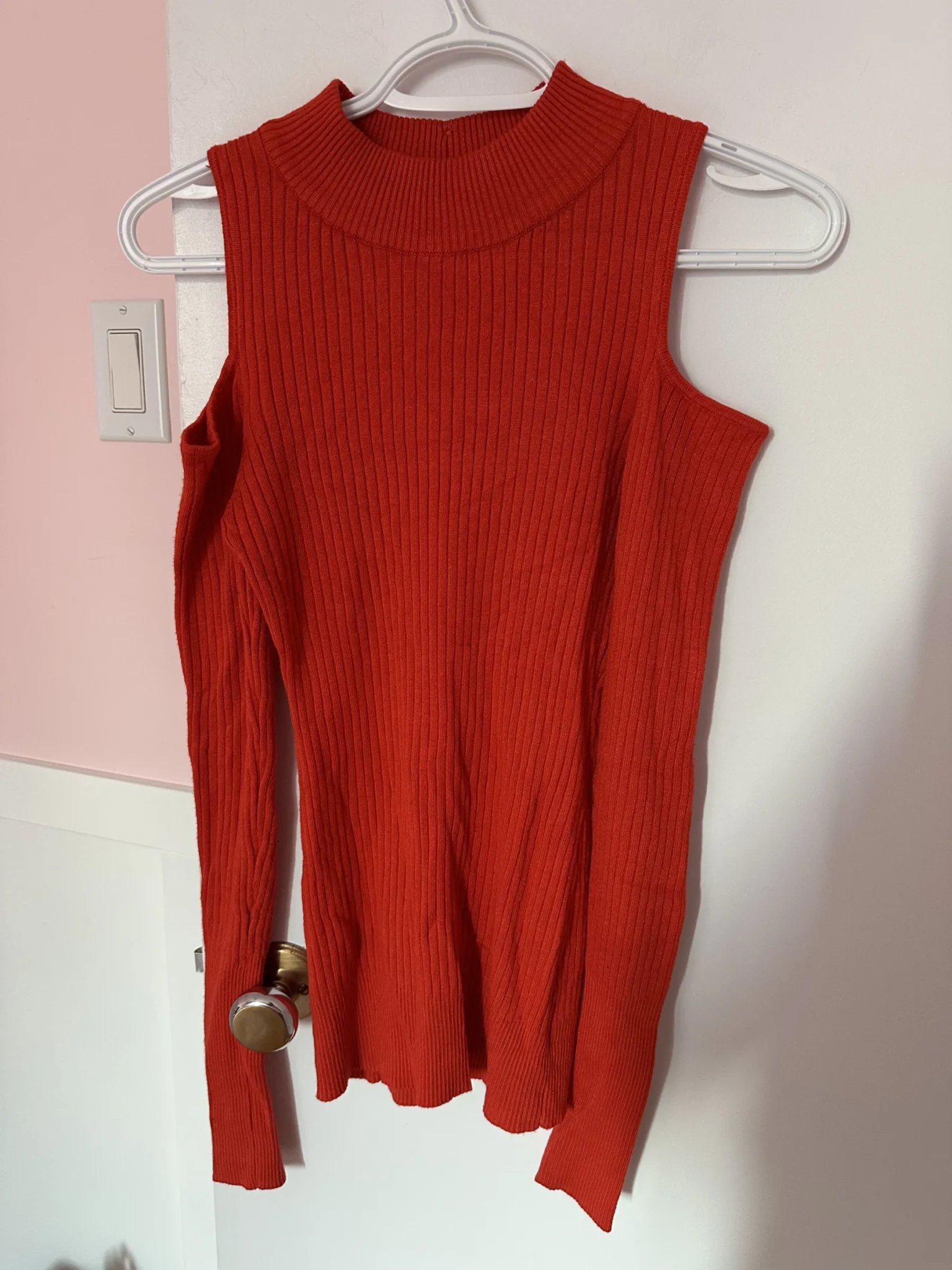 Featured image for Turtleneck jumper with cut-outs at the shoulders
