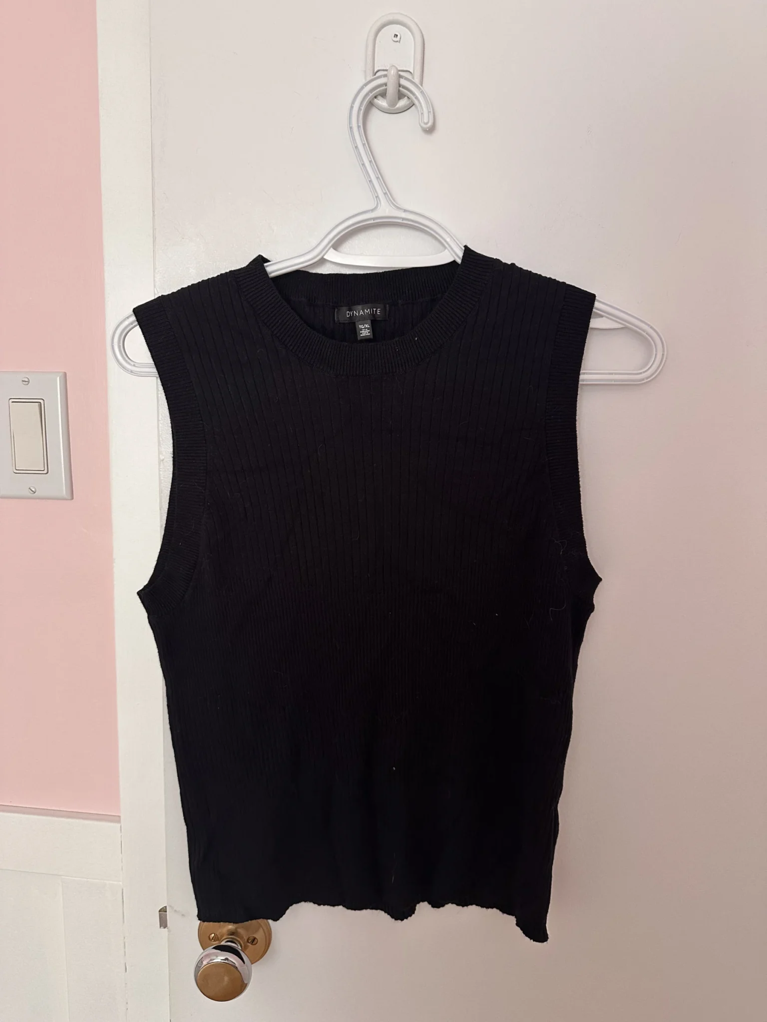 Featured image for High-necked, round-necked sleeveless jumper