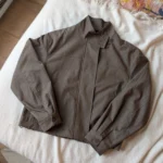 Featured thumbnail for Manteau mi-saison avec col asymétrique