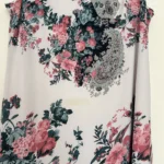 Thumbnail for Robe mi-longue sans manches blanche à motifs floraux