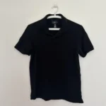 Featured thumbnail for Polo noir classique H&M – Taille xs