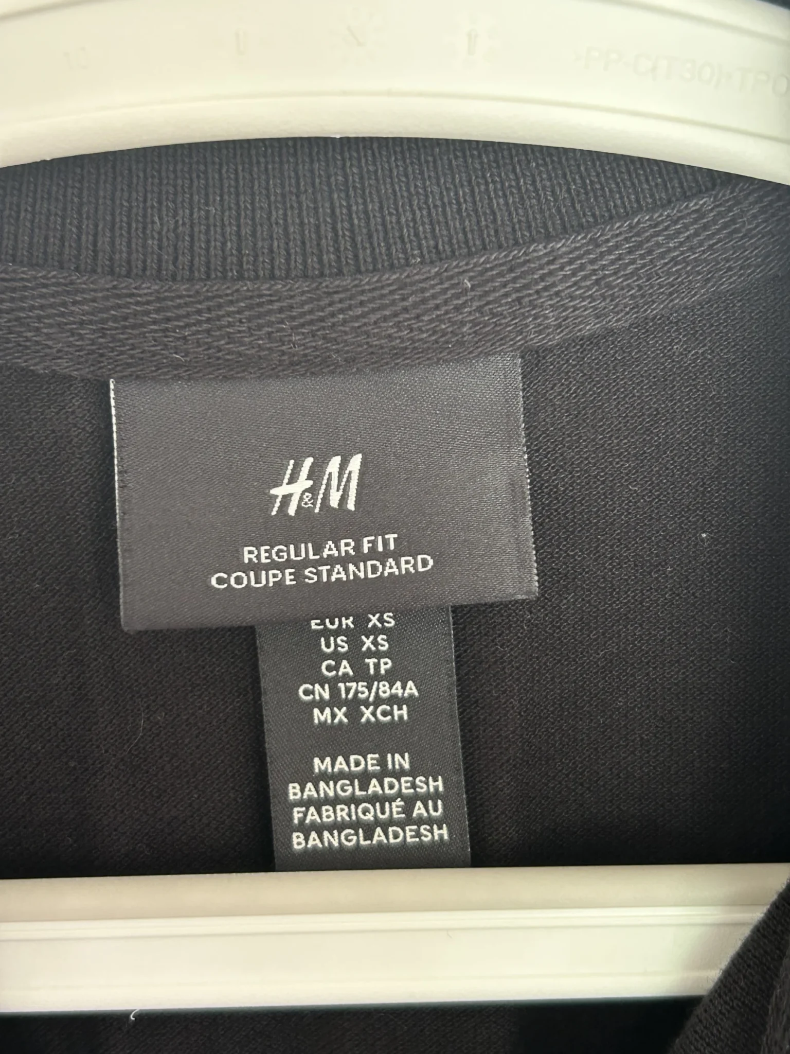 Image for Polo noir classique H&M – Taille xs