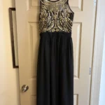 Featured thumbnail for Robe de soirée Noire et Dorée strass perles